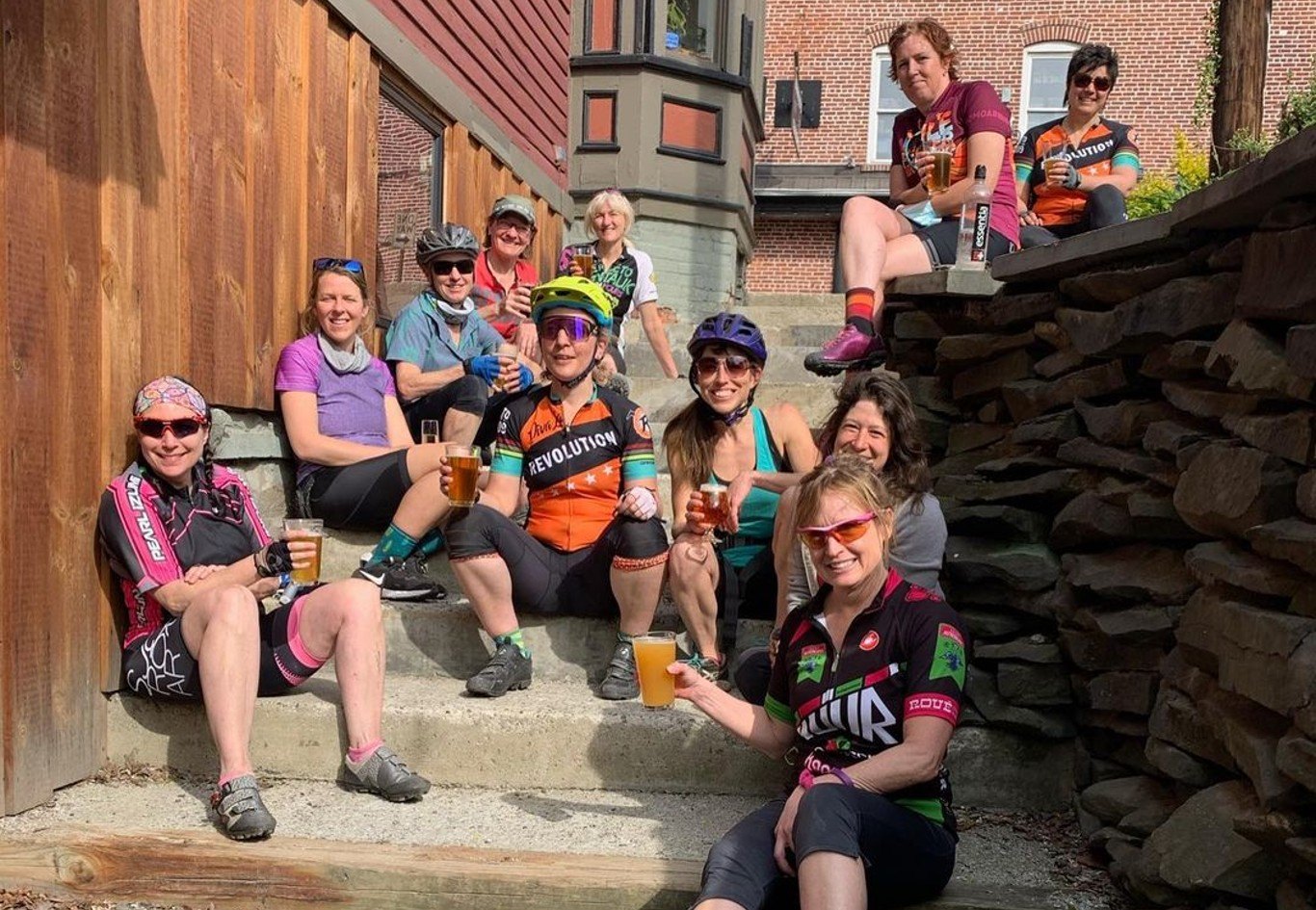 Bicyclists relax with beers after a bike ride in Ulster County, New York.
