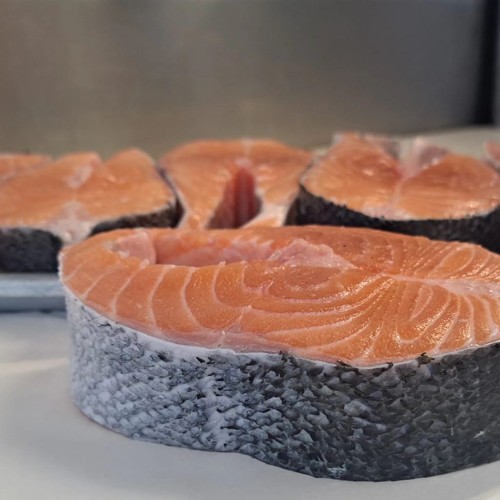 thick slices of salmon ready for cooking
