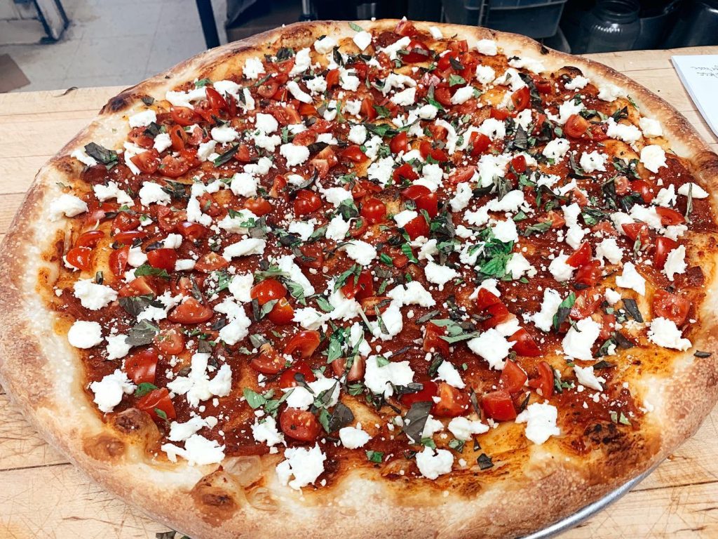 tomato, basil, and feta pizza