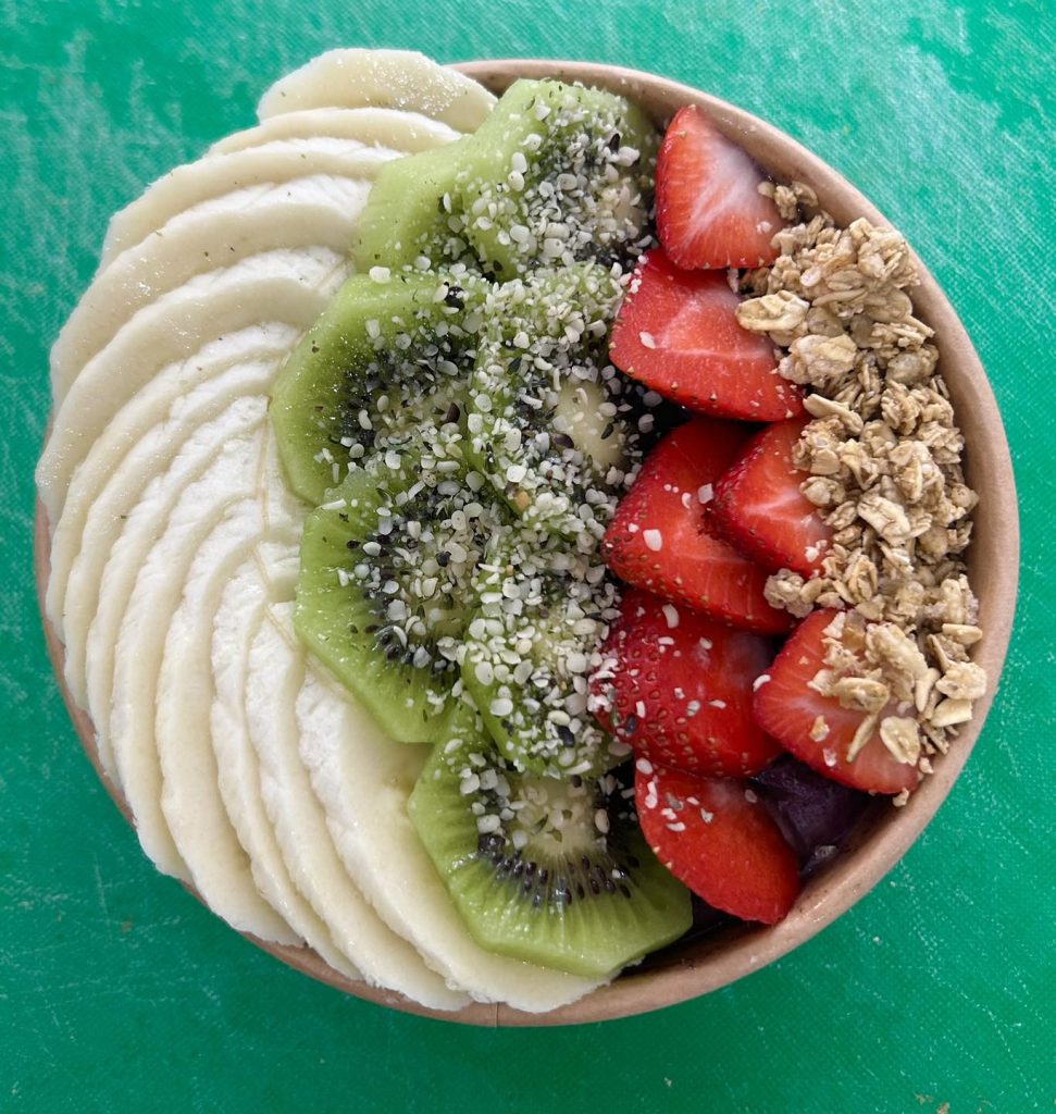 bowl of kiwi, strawberries and granola