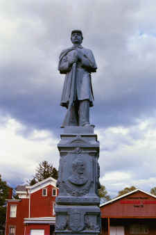 tall statue of a wartime soldier in front of the American Legion Museum in Ulster County, New York