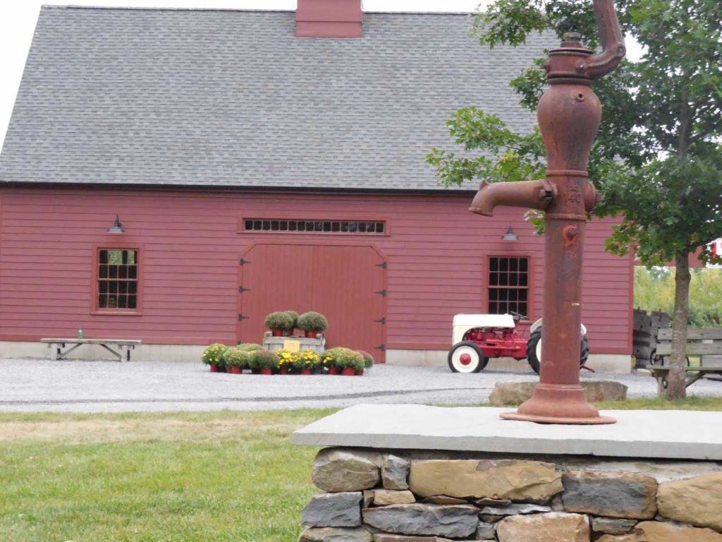 red barn with antique tractor at DuBois Farms