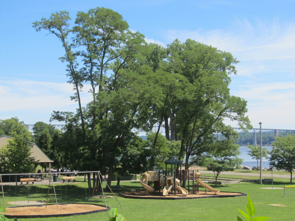 playground in Robert E. Post Park in Ulster County, NY, with the Hudson River in the background