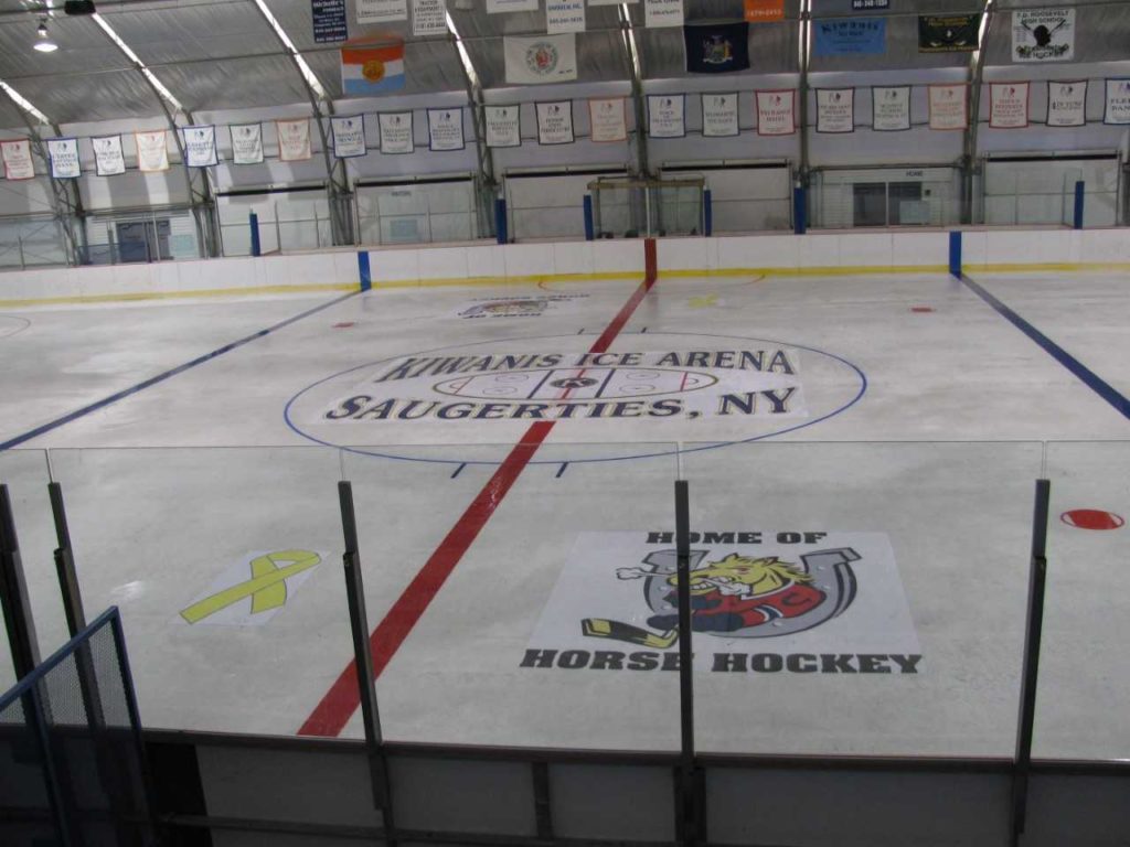ice hockey rink with logos featured on the ice