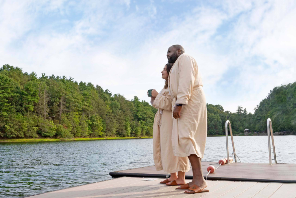 Couple in robes at water's edge at Mohonk Mountain House Spa