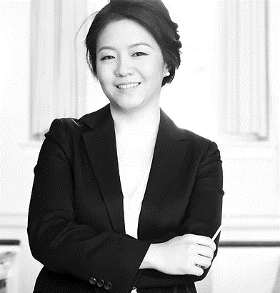 black and white photo of conductor Mina Kim