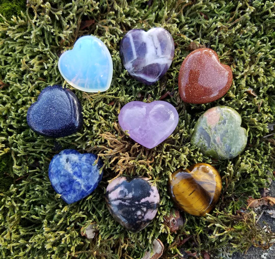 circle of colorful stones, all shaped like hearts