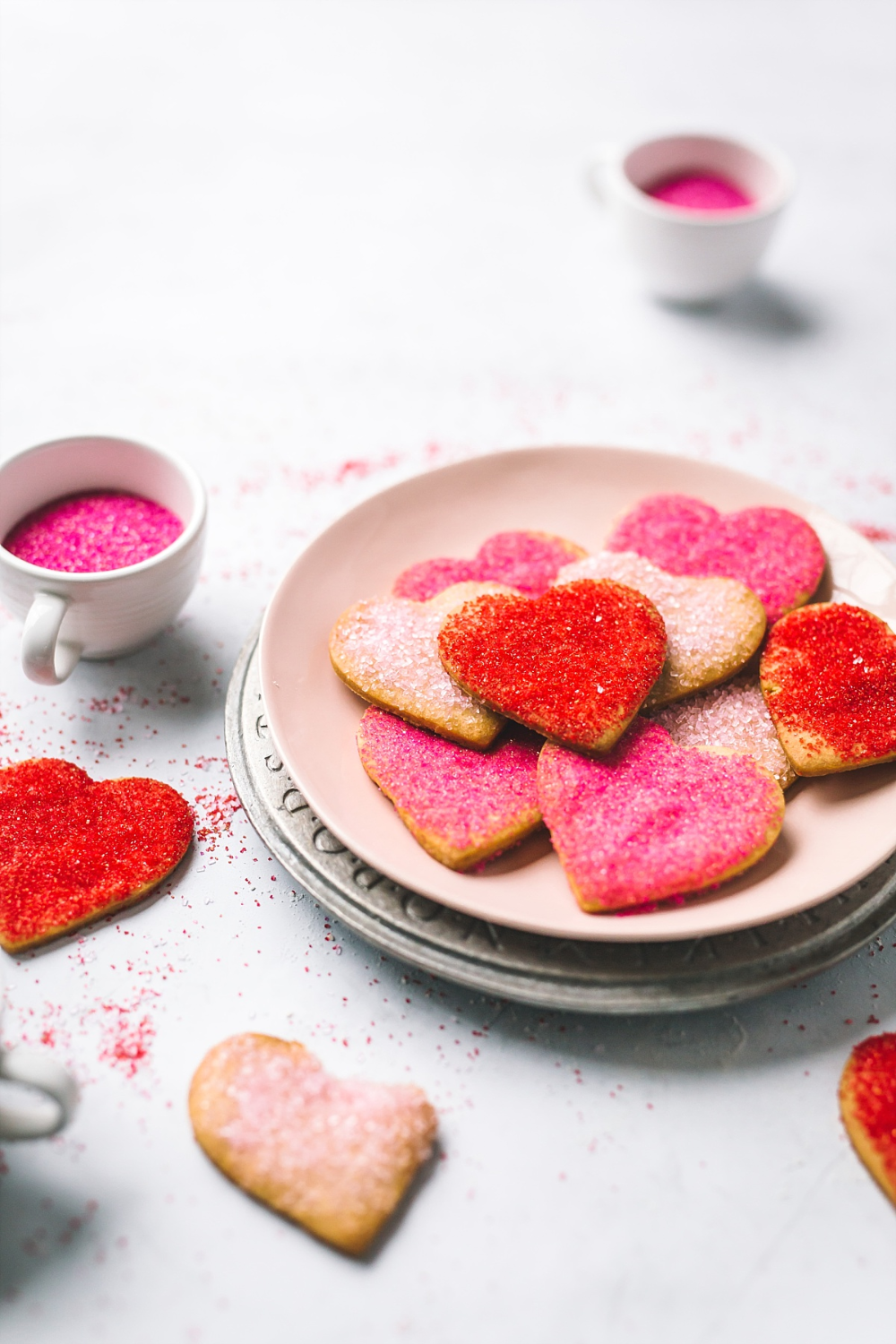 plate of pink and red heart cookies