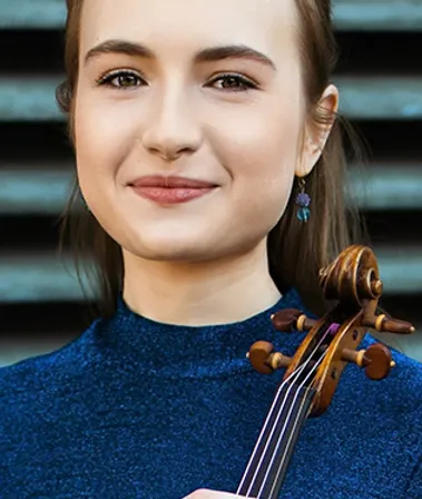 young lady posing with her string instrument