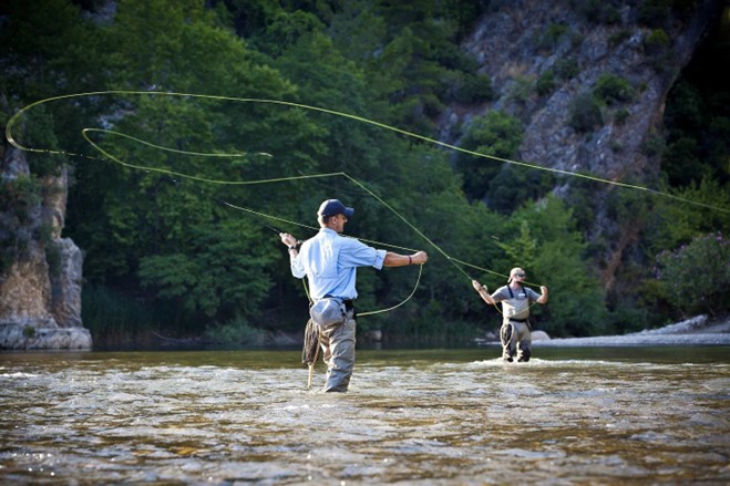 two guys fly fishing