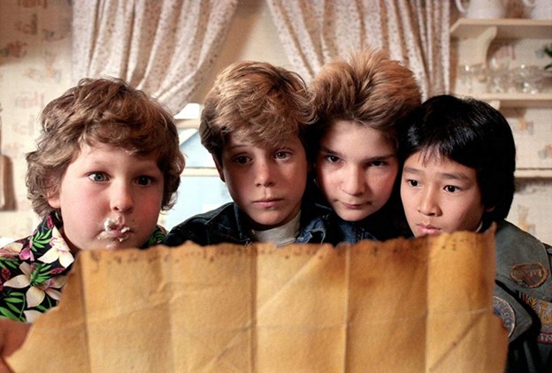 The goonies looking at the treasure map